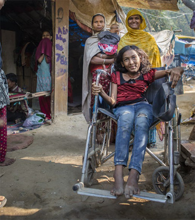 Young woman in a wheelchair (photo)
